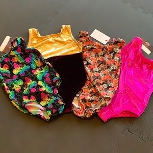 4 Size 5/6 girl’s Gymnastics leotards